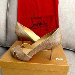 Christian Louboutin Shelley Orlato Gold pumps.